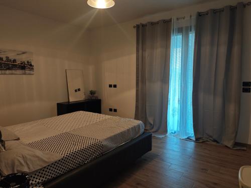 Giường trong phòng chung tại Villa il Poggio