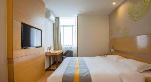 Katil atau katil-katil dalam bilik di GreenTree Inn Shanghai National Convention and Exhibition Center Huaxiang Road