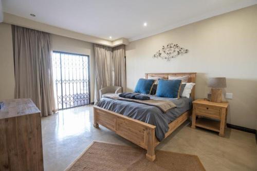 Katil atau katil-katil dalam bilik di Humdani Game Lodge