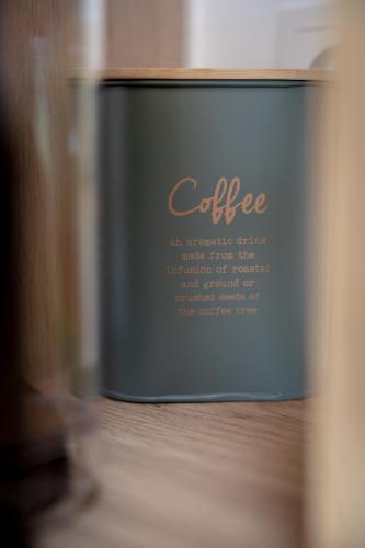 a box of coffee sitting on top of a table at KopfRausch Appartements in Feldkirch