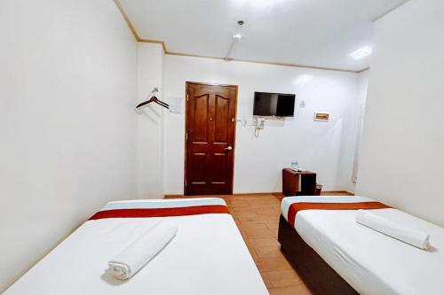 Postel nebo postele na pokoji v ubytování Casa Luciana Hotel