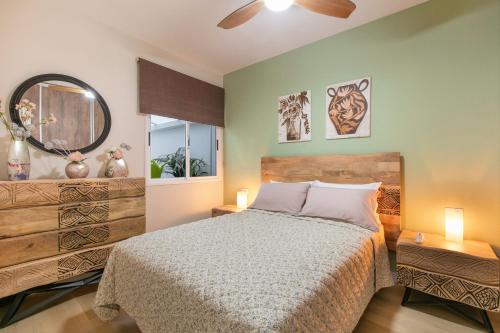 Postel nebo postele na pokoji v ubytování Casa Calma Zona Hospital