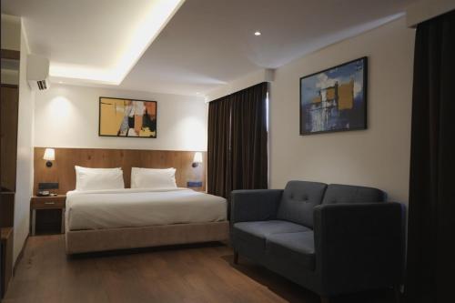 Ένα ή περισσότερα κρεβάτια σε δωμάτιο στο Silvotel By Bizzgrow Hotels