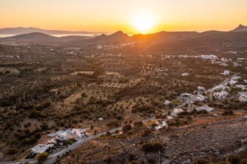 an aerial view of a city at sunset at Alkema Horizon in Philotium