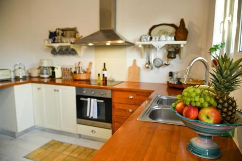 Dapur atau dapur kecil di Villa Evanna
