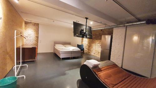 Ένα ή περισσότερα κρεβάτια σε δωμάτιο στο Loft im Szeneviertel Mannheims