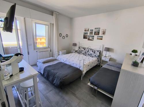 Postel nebo postele na pokoji v ubytování b&b Casa Balai 72 a 100 mt dal mare