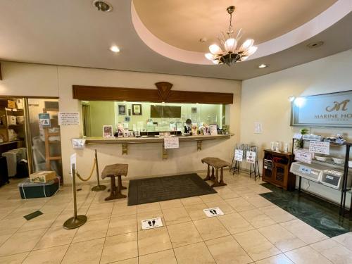 a store with a counter and stools in a room at Ichihara Marine Hotel - Vacation STAY 01372v in Ichihara