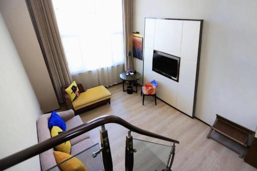 TV a/nebo společenská místnost v ubytování Zmax Changzhi Bayi Square