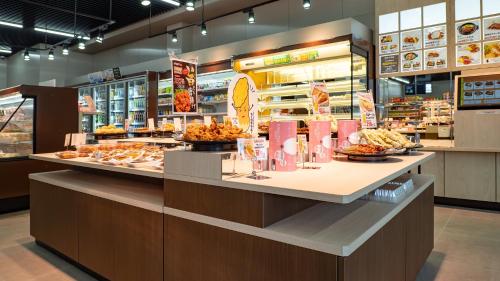 a food counter in a store with food on it at Toyoko Inn Kumamoto Airport in Ozu