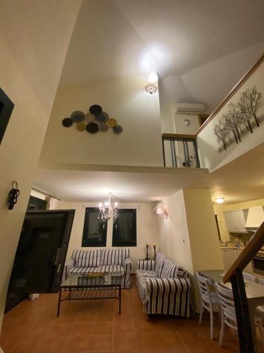 Afissos Summer house on the rocks Myrto