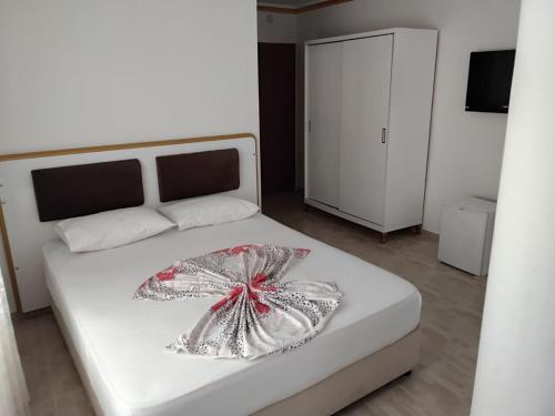 Postel nebo postele na pokoji v ubytování Jasmin Blue hotel