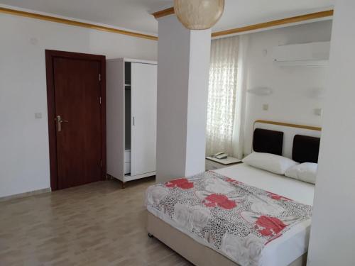 Postel nebo postele na pokoji v ubytování Jasmin Blue hotel