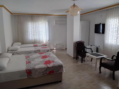 Postel nebo postele na pokoji v ubytování Jasmin Blue hotel