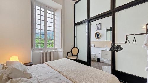 Ένα ή περισσότερα κρεβάτια σε δωμάτιο στο Appartement Maison Eugenie