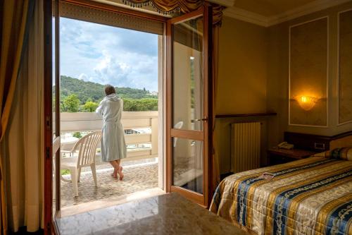 Postel nebo postele na pokoji v ubytování Hotel Apollo Terme