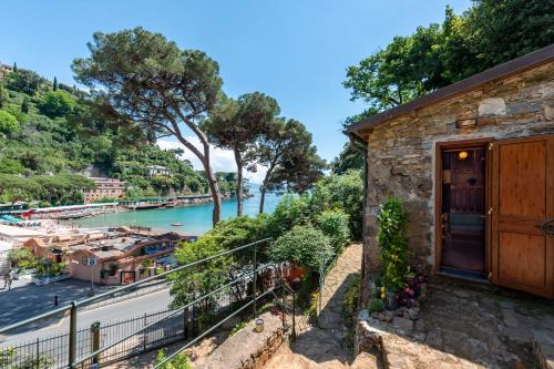a house with a view of the water at Portofino Sea View Home in Paraggi in Portofino