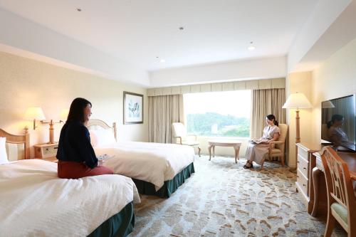 TV a/nebo společenská místnost v ubytování Hotel Associa Takayama Resort -with Natural Hot Springs-