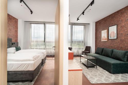 Postel nebo postele na pokoji v ubytování Best Western Hotel Presov