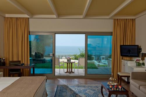 a hotel room with a view of the ocean at Le Royal Hotel - Beirut in Beirut
