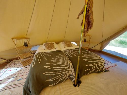 Ένα ή περισσότερα κρεβάτια σε δωμάτιο στο Glamping Luz Olive