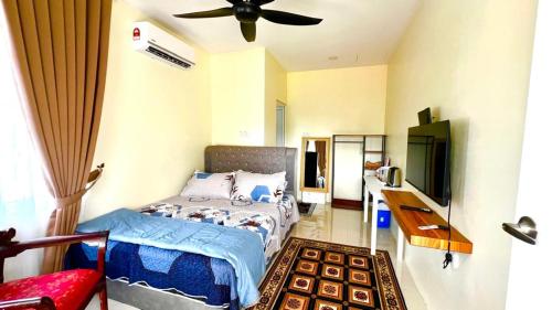 Ένα ή περισσότερα κρεβάτια σε δωμάτιο στο Elliez Abra RoomStay Azalea