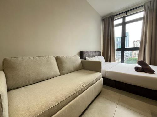 Ένα ή περισσότερα κρεβάτια σε δωμάτιο στο Arte Plus Ampang By Comfortcorner