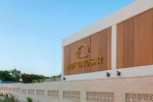 a nothofaz sign on the side of a building at Nof Ginosar Kibbutz Hotel in Kibbutz Ginnosar