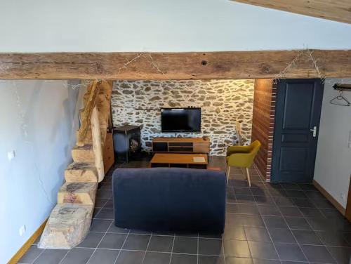 Μια τηλεόραση ή/και κέντρο ψυχαγωγίας στο Petite maison avec mezzanine