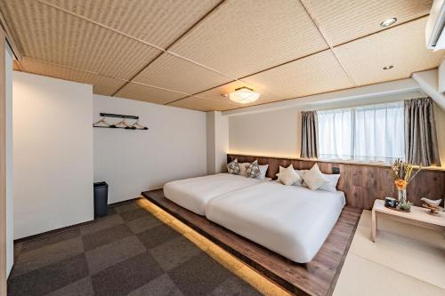 Apartment Hotel 11 Yasakaにあるベッド