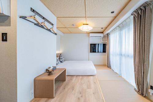 Apartment Hotel 11 Yasakaにあるベッド