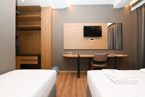 Postel nebo postele na pokoji v ubytování Hotel Panorama