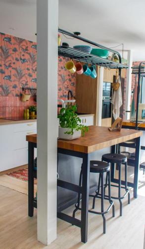 Kuchyň nebo kuchyňský kout v ubytování Magnifique maison coloniale