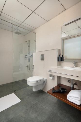 Un baño de Quad One