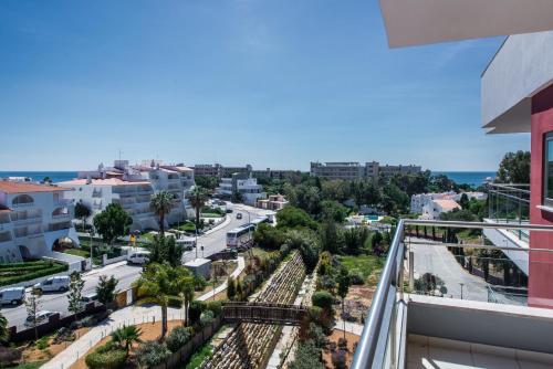 arial view of a city from a building at Areias Village Beach Suite Hotel in Albufeira
