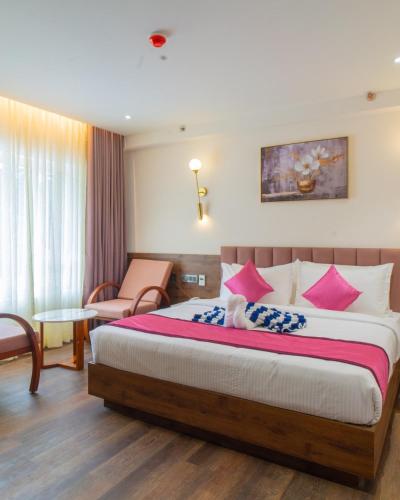 Postel nebo postele na pokoji v ubytování Senora Suites