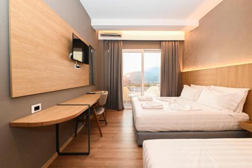 Postel nebo postele na pokoji v ubytování Hotel Panorama