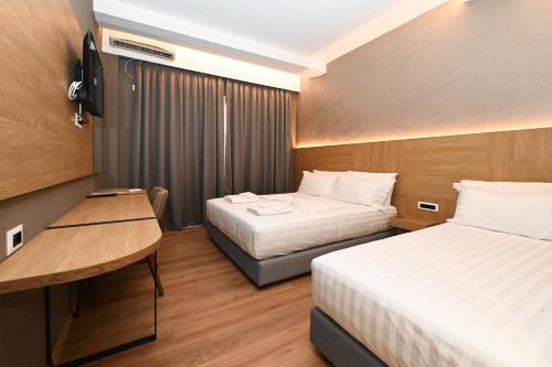 Postel nebo postele na pokoji v ubytování Hotel Panorama