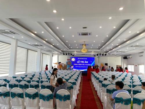 a group of people sitting in chairs in a room at SÀI GÒN - BẠC LIÊU Hotel in Bạc Liêu