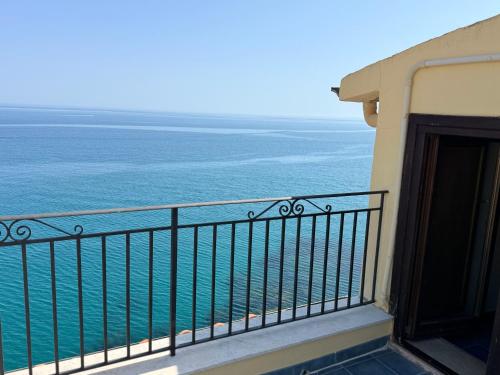a balcony with a view of the ocean at MiraMare Residence Cefalú in Cefalù