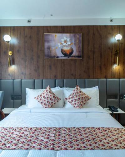 Postel nebo postele na pokoji v ubytování Senora Suites