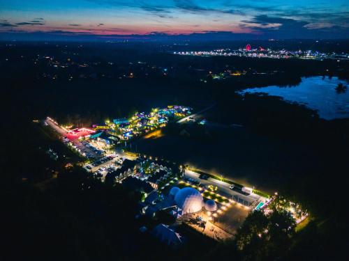 an aerial view of a city at night at SCANDINAVIA House - dom z jacuzzi in Zator