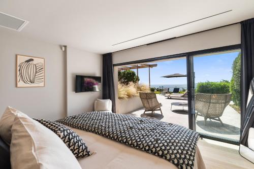 Postel nebo postele na pokoji v ubytování Sérénité Marine - Villa 14p avec piscine