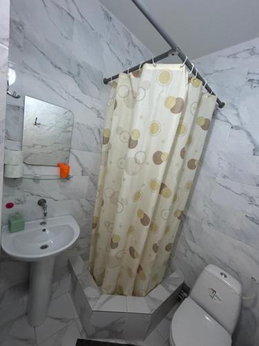 Koupelna v ubytování GRANAT Hotel