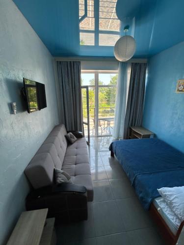 Postel nebo postele na pokoji v ubytování GRANAT Hotel
