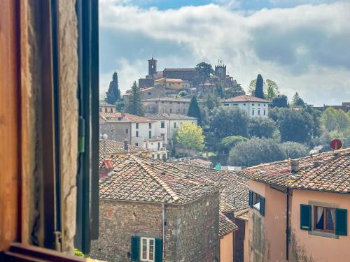 a view of a city from a window at Tuscan Nest - in Montecatini Alto in Montecatini Alto