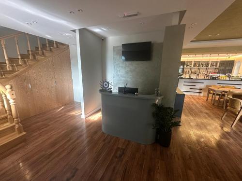 Kuchyň nebo kuchyňský kout v ubytování Flored Hotel