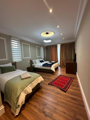 Postel nebo postele na pokoji v ubytování Flored Hotel