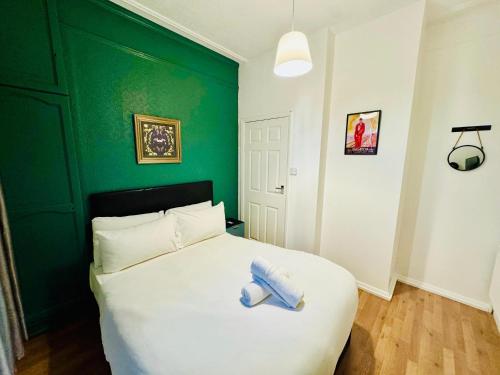 Postel nebo postele na pokoji v ubytování Number 19 Brighton