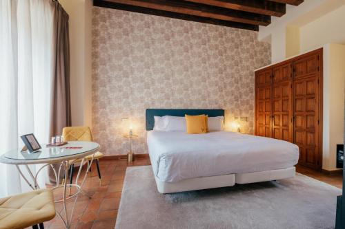 Postel nebo postele na pokoji v ubytování Hotel Cetina Palacio Ayala Berganza